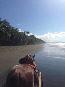 on Pinto, the horse. Corcovado. silvia and alvaro in the distance